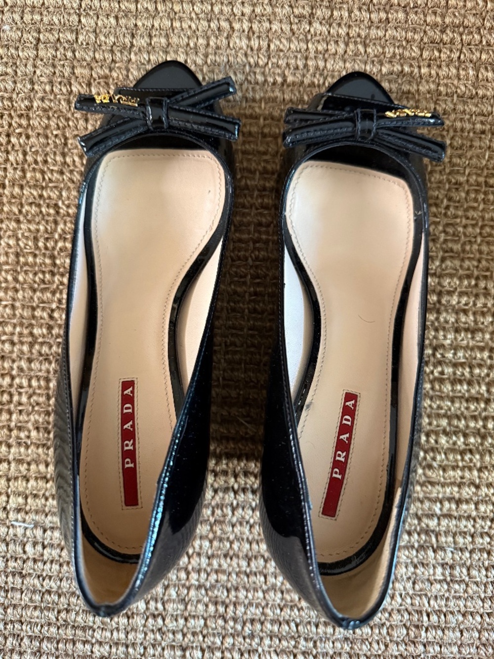 Prada bow detail black patent leather peep-toe wedges